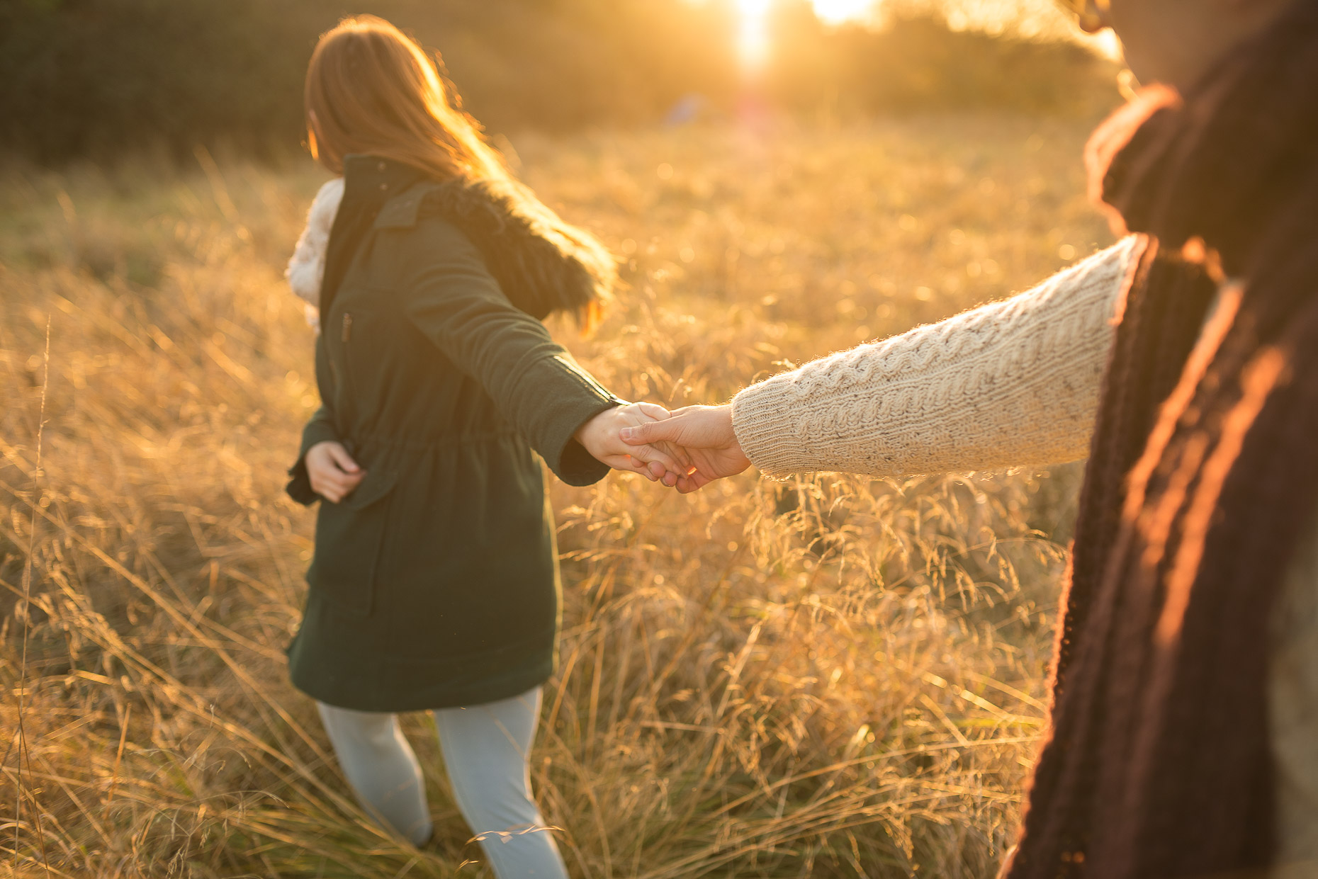 autumn-couple-hiking-together-sunset-long-grass-romance-leading-walk-epping-forest-london-uk-20